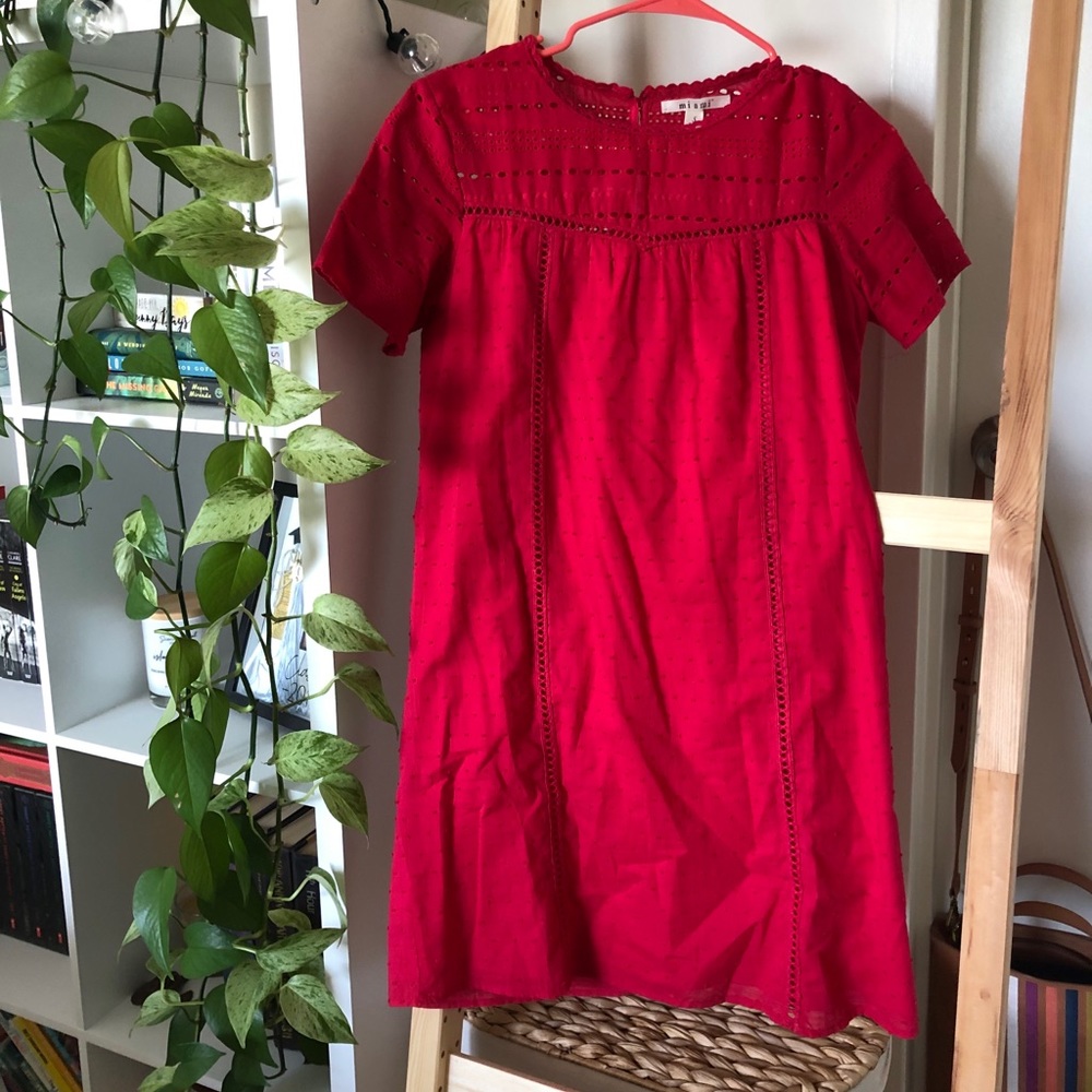 Francisca’s red eyelet lace and patterned shift